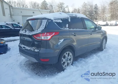 2015 Ford Escape Titanium z USA, uszkodzony, nr VIN 1FMCU9JX2FUA86006